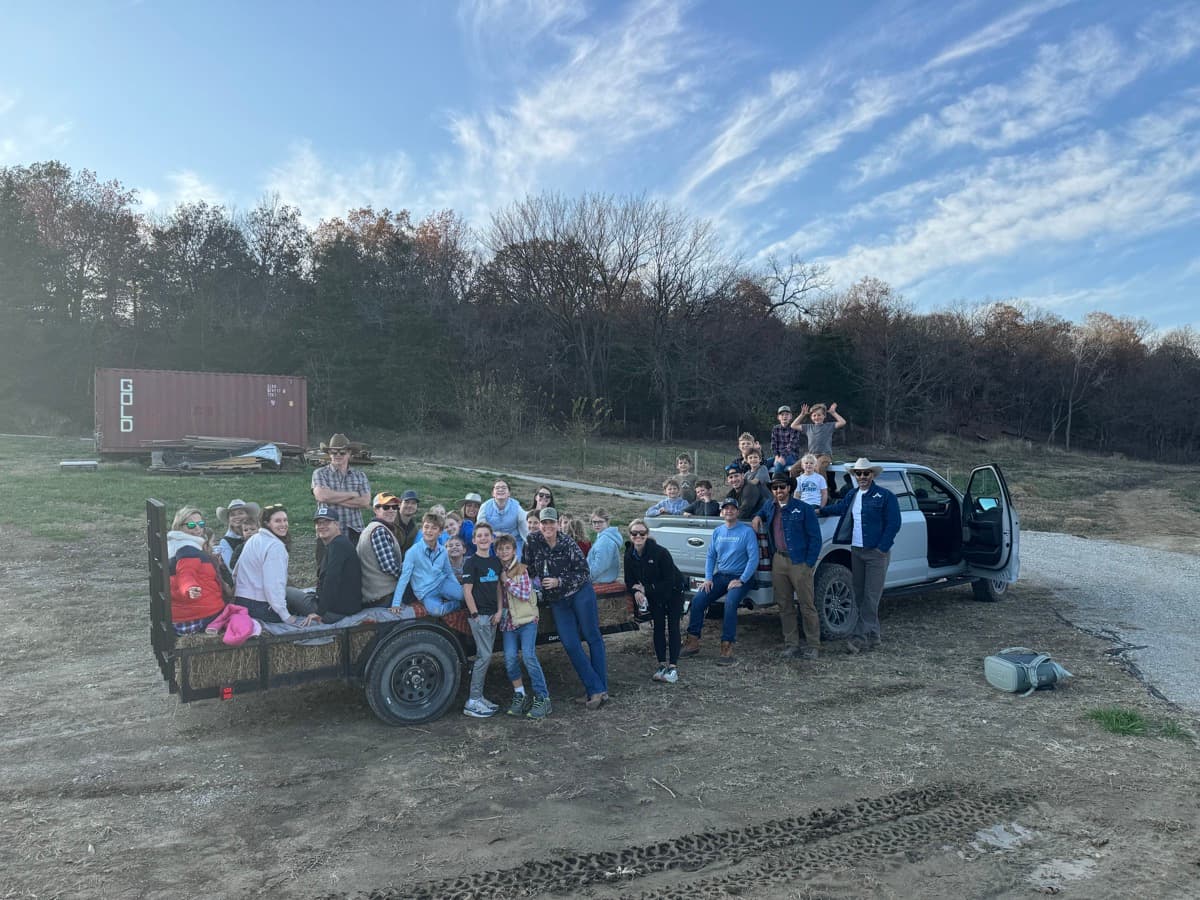 Big group piled onto a hay ride trailer
