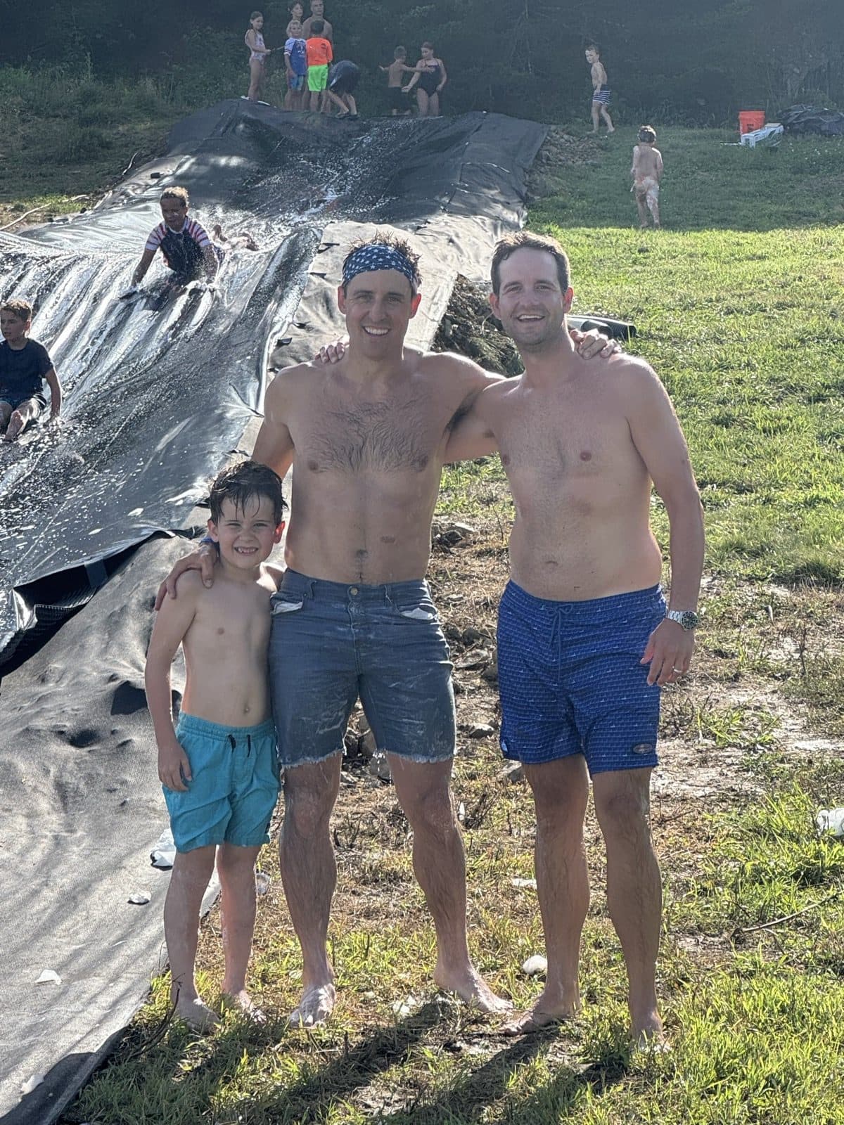 Guys standing on the creek bluff