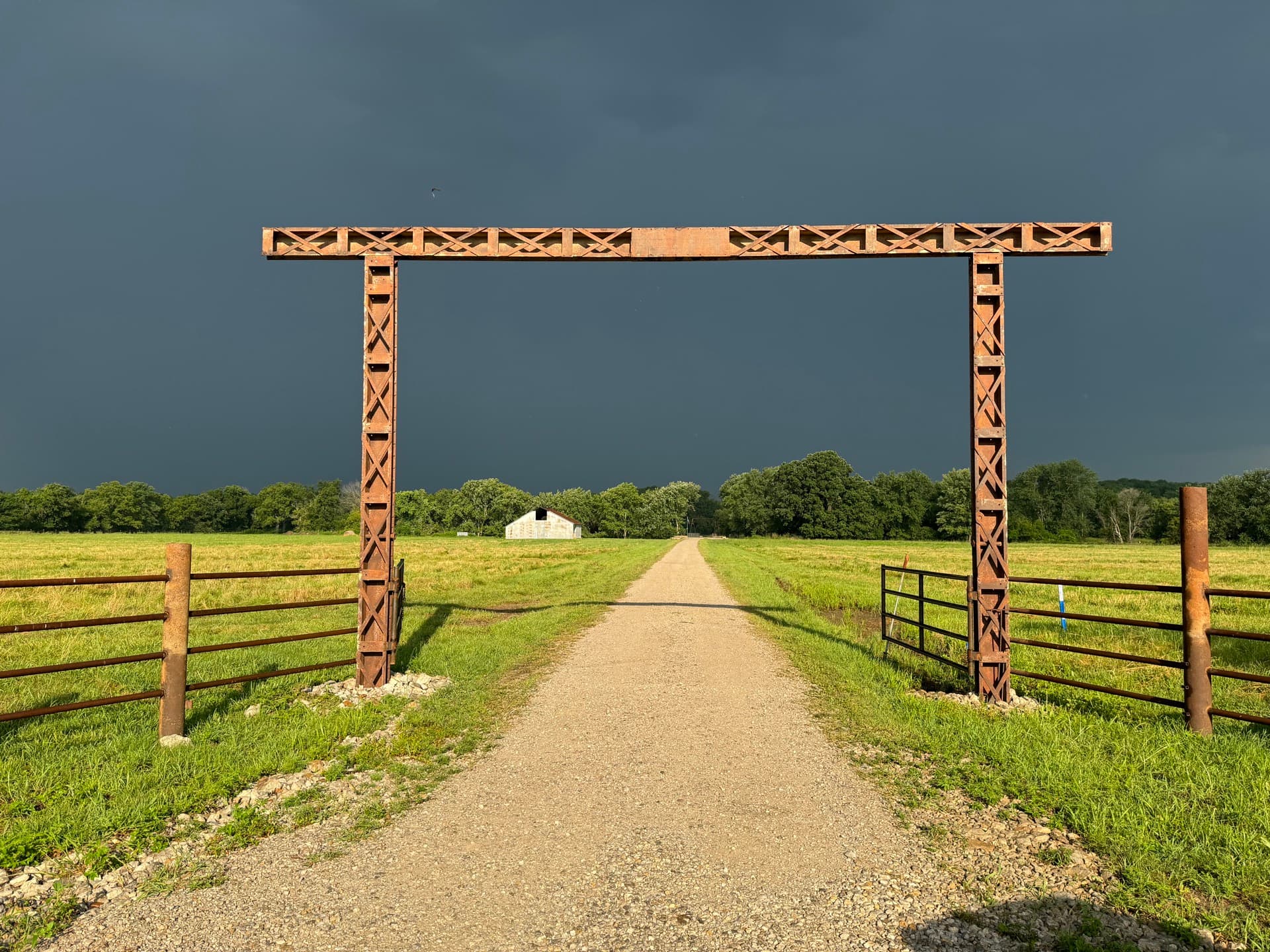 Farm gate at sunset